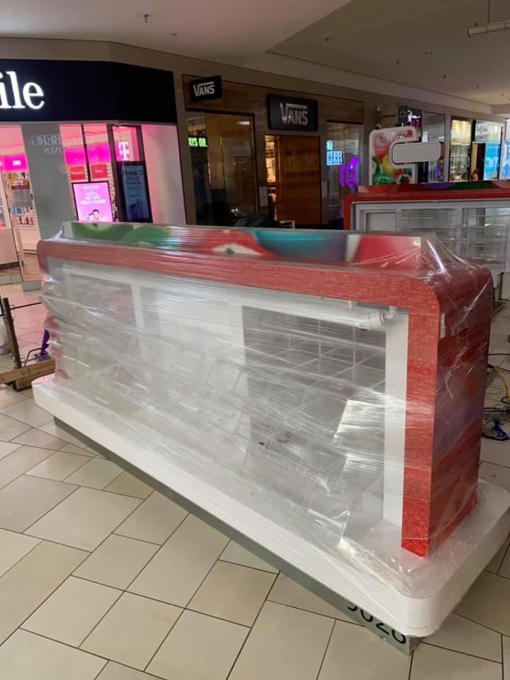 Retail Display Case Being Wrapped to be moved to a new store.