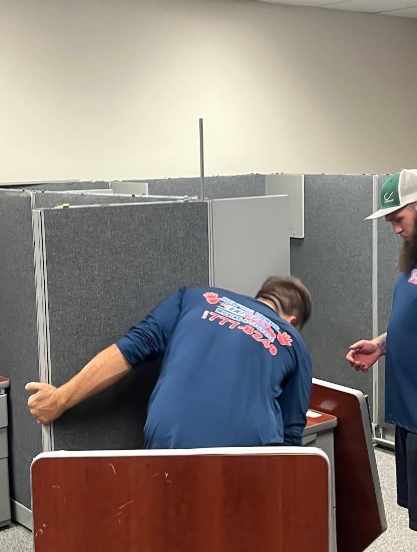 Movers 19 Office cubicle movers disassembling and relocating workstations in Jacksonville, FL