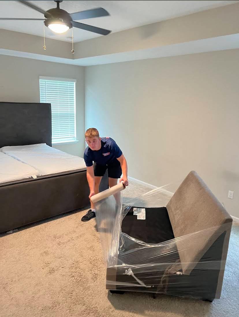 Movers 17 Professional packing services team packing an entire home room by room in Jacksonville, FL